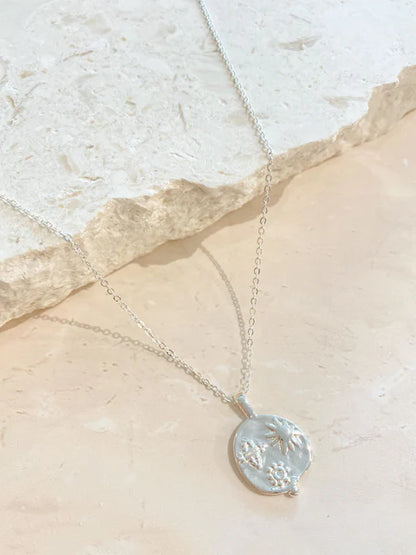 OCEAN COIN CHARM NECKLACE - SILVER
